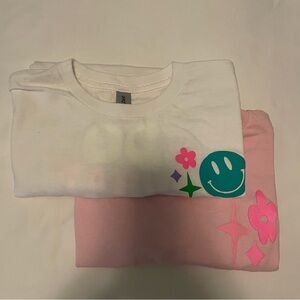 Gildan Kids Tees - White and Pink with Fun Graphics. Youth medium. New w/o tags